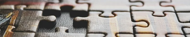 Puzzle pieces fitting together
