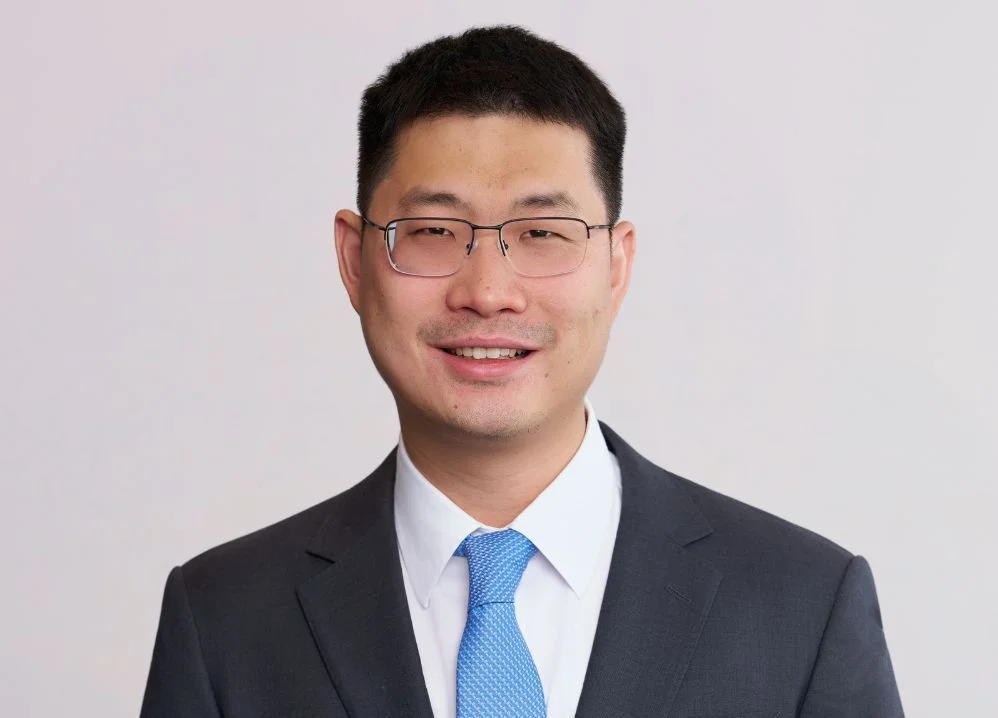Bates White bio Xunjie Zheng